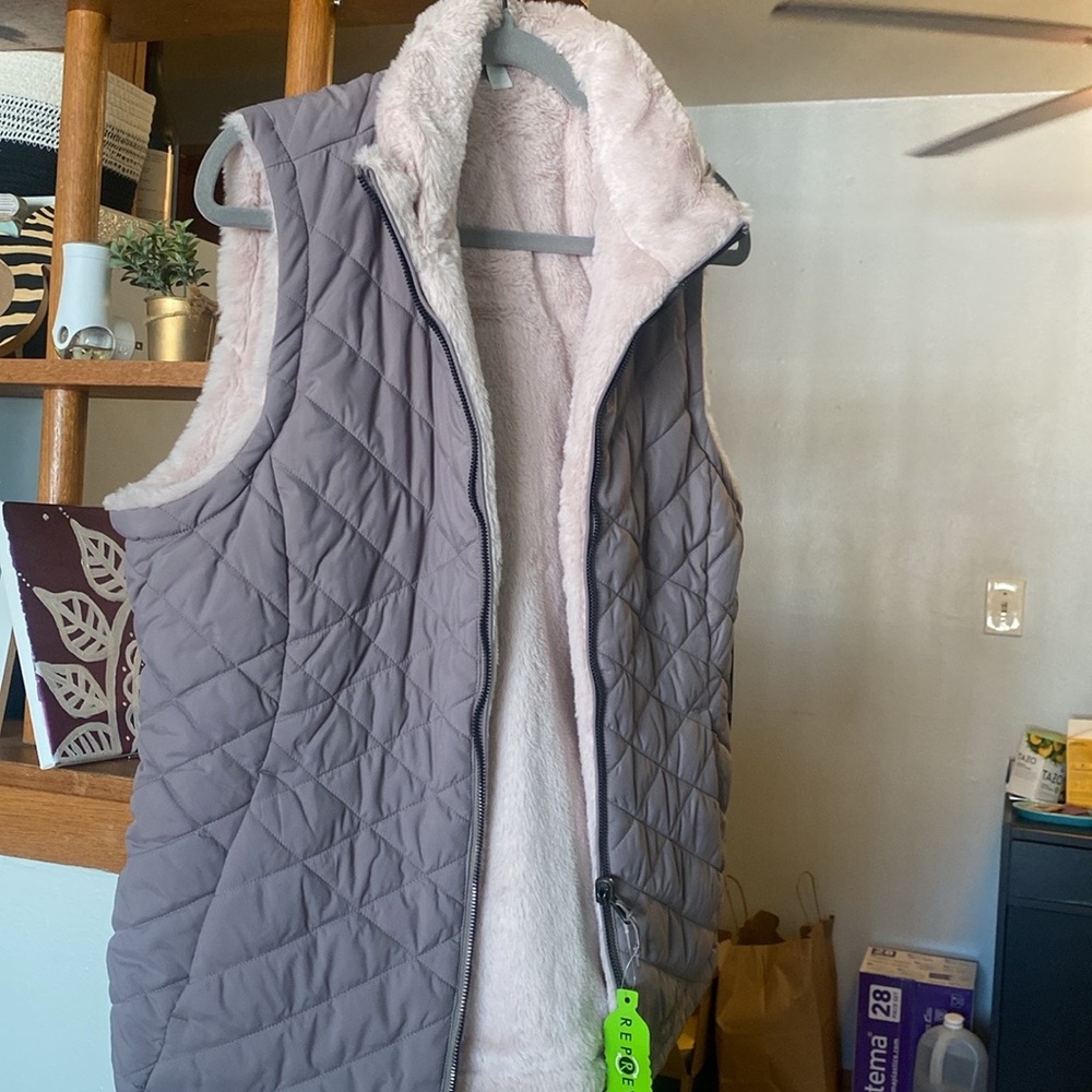 Size L vest, furry inner lining. pink (inner lining) and gray/brown outer layer